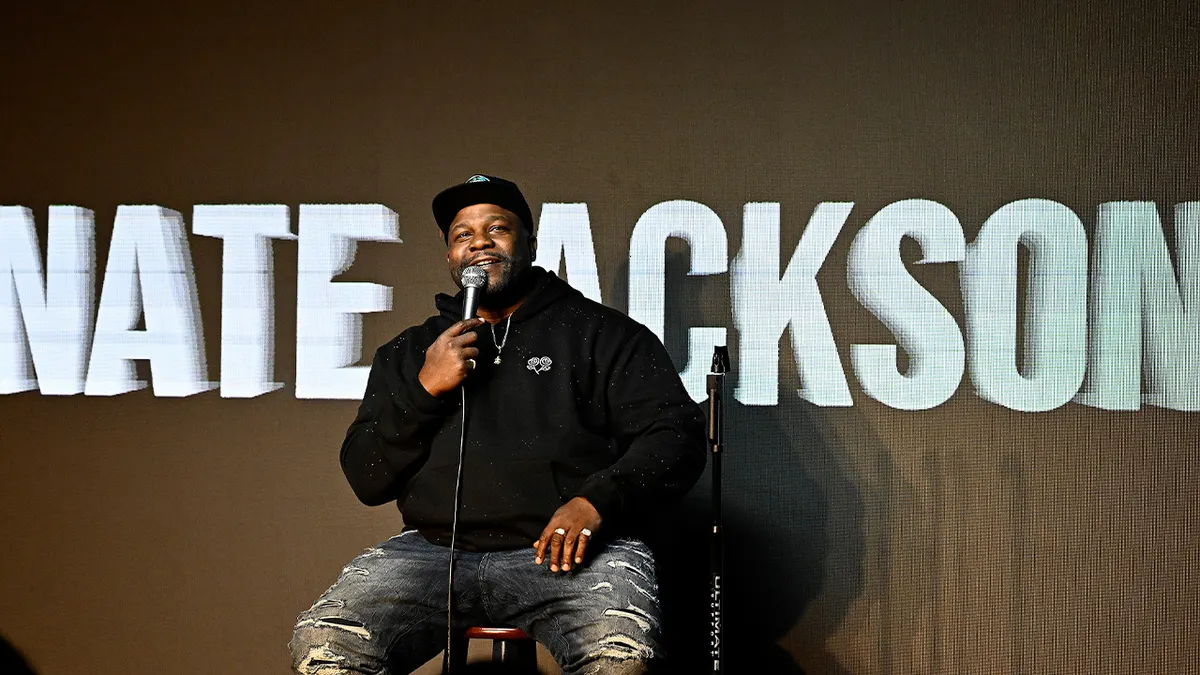 Nate Jackson performing on tour